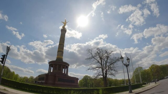 Driving on a roundabout with a view of the Victory Column in Berlin, Germany.