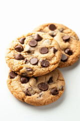 Two freshly baked chocolate chip cookies with a golden-brown crust and gooey chocolate chips, perfect for a sweet treat.