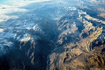 Fototapeta premium Aerial exploration of majestic mountainous landscapes in the andes scenic nature photography vast terrain breathtaking viewpoint and unmatched natural beauty
