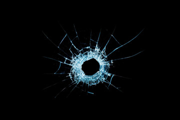 Cracks from broken glass fragments on a black background, the concept of destruction and instability