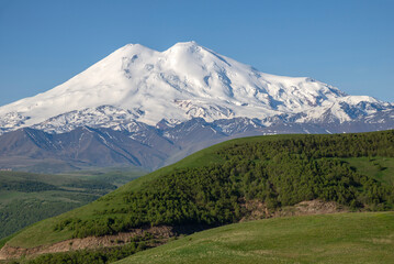 Fototapeta premium Mountain landscape with a view of Elbrus. Kabardino-Balkaria, Russia