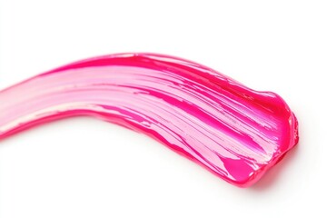 A close-up shot of pink paint on a white surface