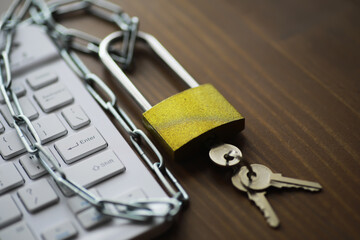Cybersecurity Concept: Locked Keyboard with Chain and Padlock Representing Data Protection