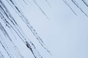 Close-up of Winter Icicles Against a Clear Blue Sky