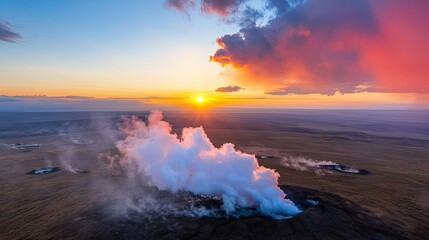 Fototapeta premium Volcanic landscapes concept. Majestic sunset over volcanic landscape with steam billowing into the sky.
