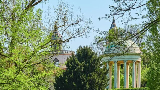 Parco Querini is green area of city of Vicenza, Italy. Monopteros is circular colonnade supporting roof but without any walls. Unlike tholos, it does not have walls making cella or room inside.