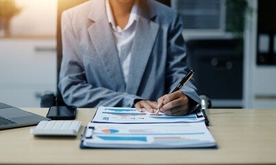 Fototapeta premium Business Documents, Auditor businesswoman checking searching document legal prepare paperwork or report for analysis TAX time,accountant Documents data contract partner deal in workplace office