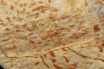 A close-up of the traditional Moroccan flatbread known as Msemmen or Msemen