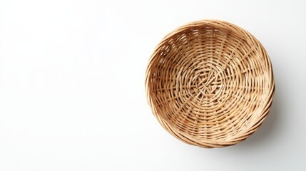 Fototapeta premium Natural Woven Basket on White Blank Canvas Top View Ideal for Mockup Design