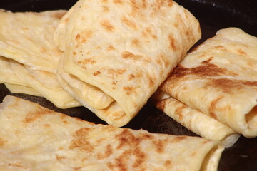 A close-up of the traditional Moroccan flatbread known as Msemmen or Msemen