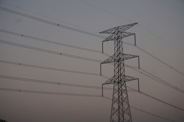 High voltage electricity transmission tower with the copy space, Electricity distribution pylon...