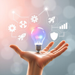 Hand Holding Light Bulb with White Technology Icons on Blurred Background