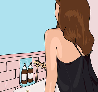 Woman with Brown Hair Looking at the Bathroom Mirror