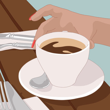 Woman's Hands Holding Coffee Cup and Spoon