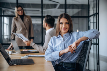 Diversity of people. Professional workers are in the modern office together