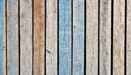 Wooden fence or wall made of vertical weathered wooden planks.