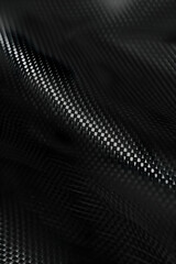 Abstract texture of flowing black fabric with subtle highlights creating depth and movement
