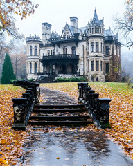 Obraz premium Autumnal Mansion Path to Gothic Estate