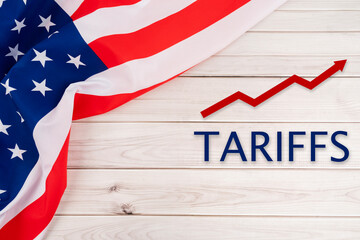 Trade Tariffs concepts with United States of America Flag on the table.