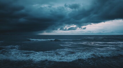 Fototapeta premium Dramatic clouds hover over a restless sea, enveloping the scene in a moody twilight ambiance.