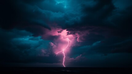 A vivid lightning bolt slices through ominous clouds above a dark sea, showcasing the raw power and unpredictable nature of a stormy night.