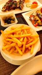 French fries dominating a croatian summer vacation meal