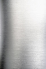 Brushed metal surface with subtle reflections and texture