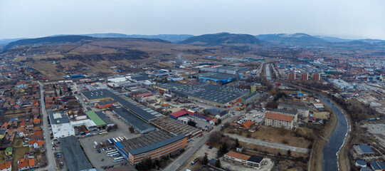 Fototapeta premium Aerial view of the industrial area in Odorheiu Secuiesc city - Romania