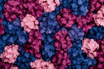 Obraz premium Abstract floral background featuring vibrant pink, purple, and blue flowers creating a visually stunning pattern suitable for seasonal designs and promotions