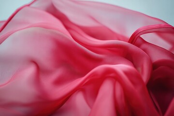 Obraz premium Crimson Silk Swirl: Elegant Red Fabric Dancing in the Wind, Isolated on Pure White Background. Perfect for Fashion, Beauty, and Luxury Branding Designs. Adds a touch of sophistication and movement to 