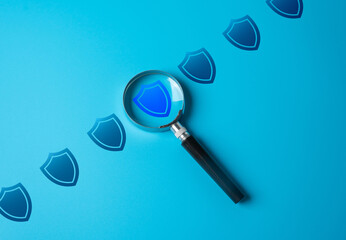 Magnifying glass and protective contour. Checking and monitoring the safety and inviolability of a...