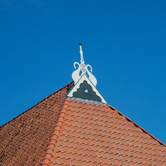 Typical wooden decoration of farmhouse in Dutch province Friesland, Netherlands