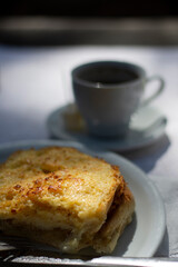 Traditional Serbian meal komplet lepinja with coffee and Turkish delight in the background