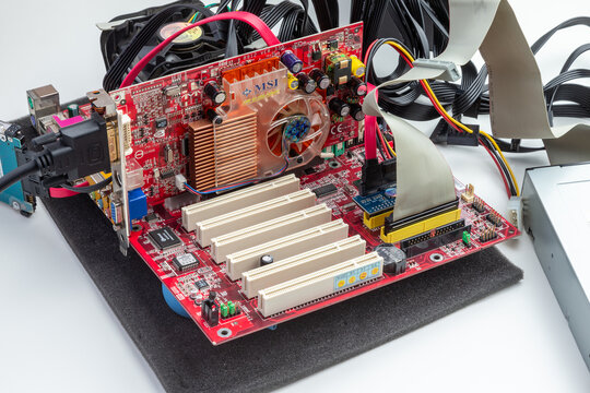 Detailed View of an Older Motherboard With Components and Connections for agp graphics card tests