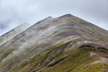 Palccoyo Rainbow Mountain unfolds in breathtaking layers of color, a hidden gem in the Peruvian Andes. Unlike its famous sibling, this serene wonder offers a tranquil journey through vibrant landscape