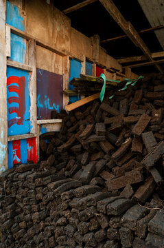 Pile of Peat Bricks in Large Garden Shed