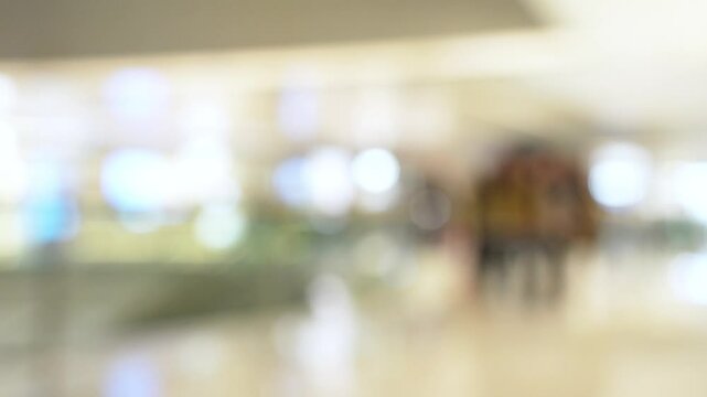 Abstract blur and defocus shopping mall in department store interior for background