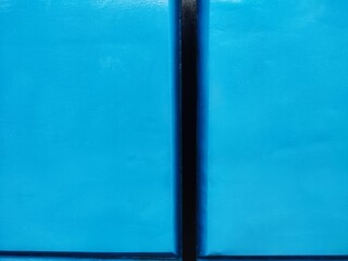Fototapeta premium iron fence with blue and black color