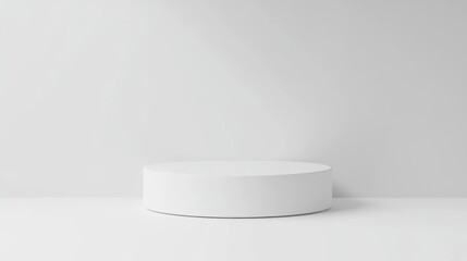 A white display pedestal placed against an all-white backdrop offers a versatile space for elegant product showcases or message overlays.