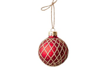 Classic Red Christmas Ornament: Festive Holiday Decoration Hanging on Simple String. Perfect for cards, websites, and festive designs. A simple, elegant Christmas ball, symbolizing the spirit of the  