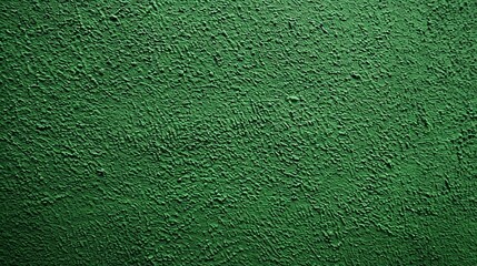 Textured green wall surface with subtle variations, ideal for backgrounds or design projects