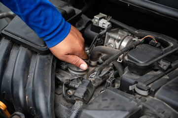 Obraz premium Do-it-yourself car repair old auto mechanics.Hands tools with Auto mechanic concept.