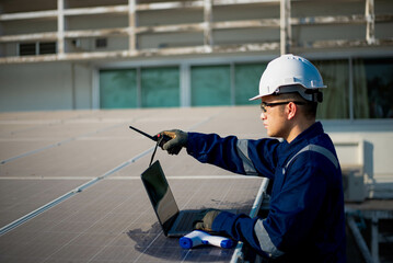 An experienced electrician is checking the proper operation of the office's power backup system.
