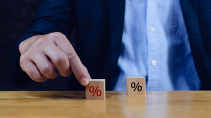 Percent sign, Financial, stocks, interest rate and GDP percent change, wooden block with percentage...