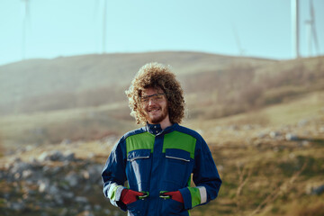 Naklejka premium An African American Engineer Celebrates the Successful Completion of a Wind Turbine Project.