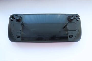 Fototapeta premium Portable game console on a white background 