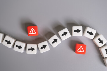arrow avoid risk warning sign on red cube with copy space. Risk management concept with preventive plan for any accident or unplan incident to protect business or system from failure or crisis.