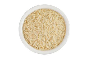 rice basmati in a ceramic bowl isolated on white background. Top view. Flat lay