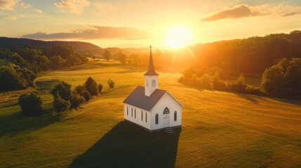 Fototapeta premium White church with steeple in field