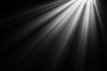 Bright light rays shining through dark background create dramatic effect. interplay of light and shadow evokes sense of mystery and depth